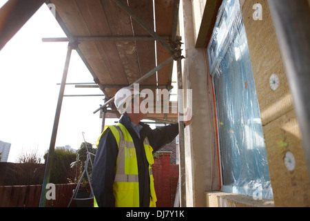 An external wall insulation system EWI being installed as part of the UK Governments Energy Company Obligation ECO Stock Photo