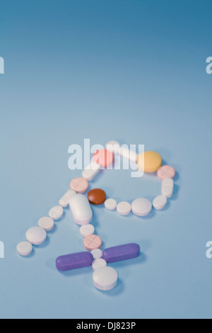 Pills arranged in Rx symbol Stock Photo