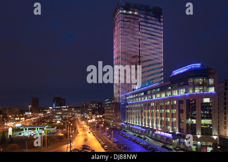 Night view of illuminated building business center tower on the Constitution Square, next to Lenenergo. St. Petersburg, Russia