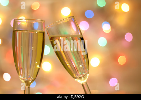 Two glasses of champagne on blurred new year party background Stock Photo