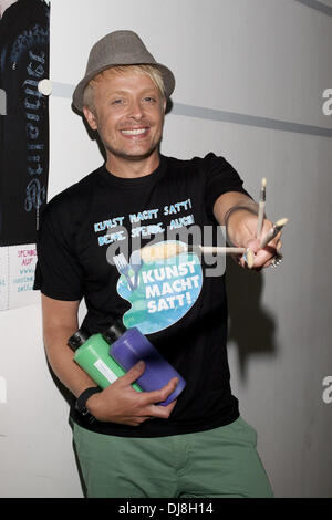 Ross Antony launches charity art project 'Kunst macht satt' at Otto-Studios. Hamburg, Germany - 04.07.2012 Stock Photo