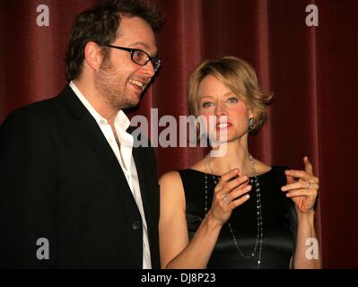 Actress Jodie Foster and director Robert Schwentke during the premiere of 'Flightplan' in Berlin. Stock Photo