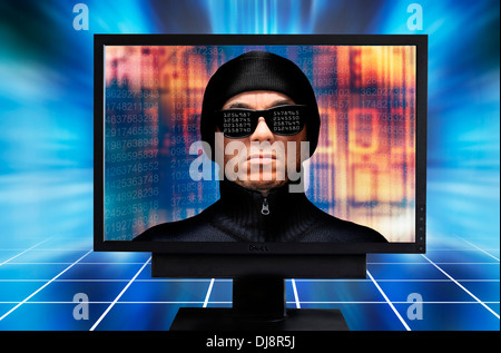 hacker inside a computer monitor Stock Photo