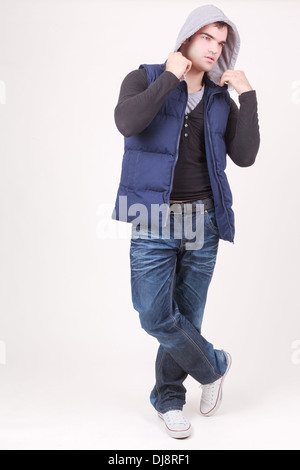 Relaxed charismatic young man in a hooded top Stock Photo