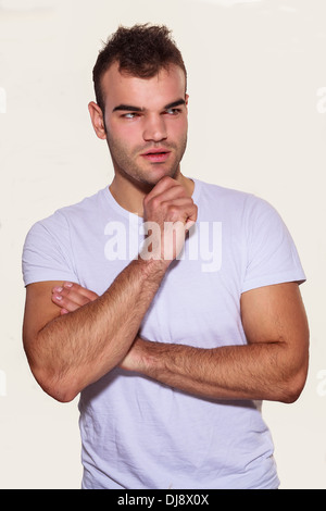 Thoughtful man planning and scheming Stock Photo