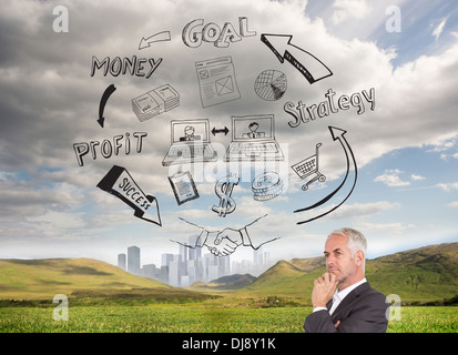 Mature thoughtful businessman looking away Stock Photo