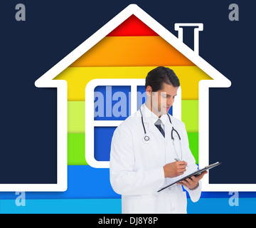 Smiling doctor holding pen and clipboard Stock Photo