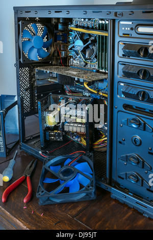 Repairs inside a desktop computer. Stock Photo