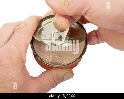 hands opening tin of canned food, studio shot, isolated on white Stock Photo