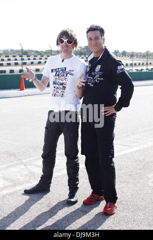 Mickie Krause and Andy Bar filming a car race for German VOX TV show 'Promis am Limit' at Circuito Mallorca race track near El Arenal. Majorca, Spain - 08.05.2012 Stock Photo