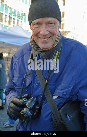 New York Times photographer Bill Cunningham who specializes in photographing street fashion. Union Square Green Market Manhattan Stock Photo