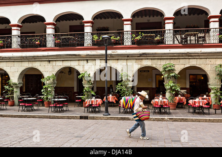 Early morning in the historic Zocalo or plaza in Oaxaca, Mexico. Stock Photo