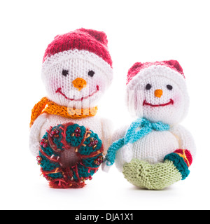 Two knitted christmas snowmen isolated on white Stock Photo
