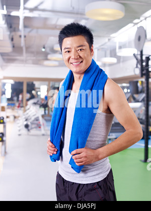 man standing in gym smiling Stock Photo