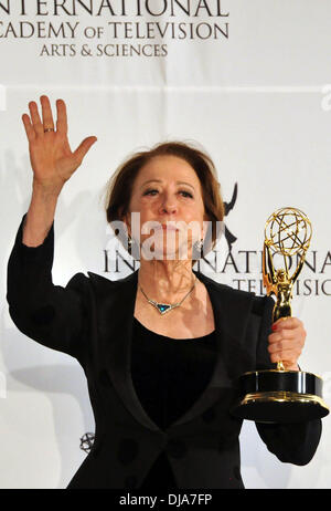 New York, NY, USA . 25th Nov, 2013. Brazilian actress Fernanda Montenegro poses after winning 'Best Performance by An Actress' award for her role in 'Sweet Mother' during the 41st International Emmy Awards Gala in New York, the United States, Nov. 25, 2013. Credit:  Xinhua/Alamy Live News Stock Photo