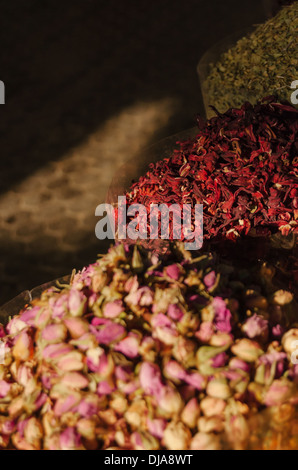 Exotic spices and herbs lined up for sale at Deira Spice Market. Dubai, United Arab Emirates. Stock Photo