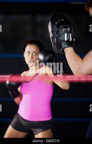 Female boxer focused on her training Stock Photo