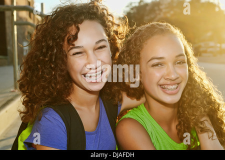Mixed race girls smiling Stock Photo
