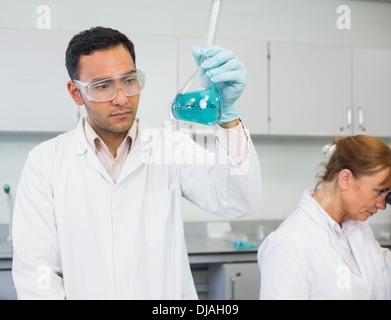 Researcher experimenting in the lab Stock Photo