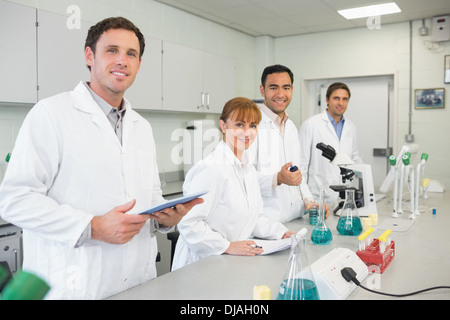Group of scientists working in the lab Stock Photo