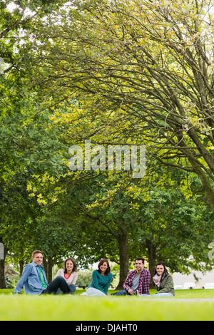 College students sitting in the park Stock Photo - Alamy