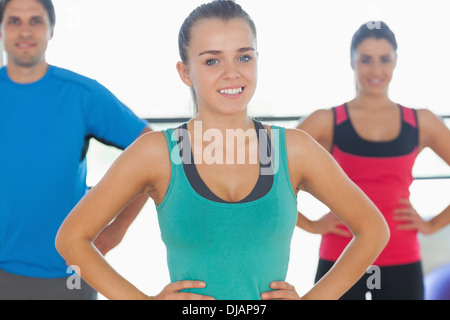 Portrait of smiling toned people at yoga class Stock Photo
