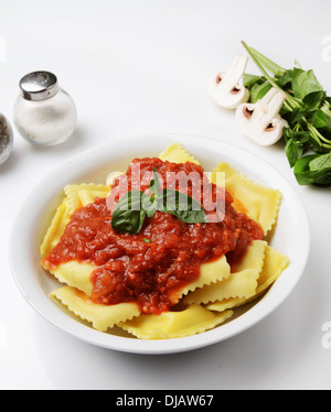 plate of Ravioli with marinara sauce Stock Photo