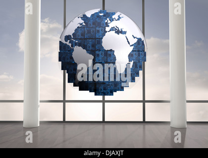 Blue globe floating in room Stock Photo