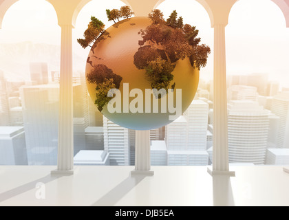 Earth floating in room Stock Photo