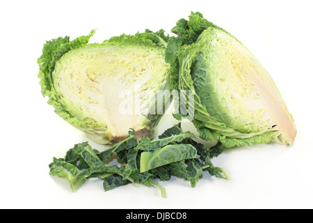 a sliced savoy cabbage against white background Stock Photo