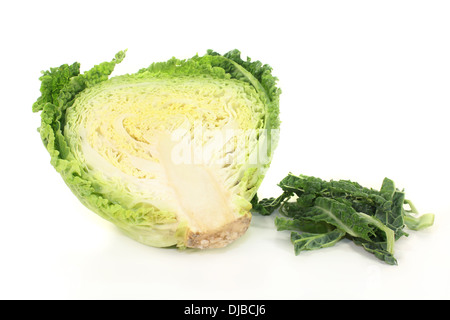 a sliced savoy cabbage against white background Stock Photo