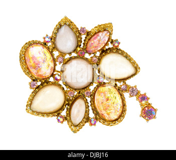 A very old brooch showing details on a white background. Stock Photo