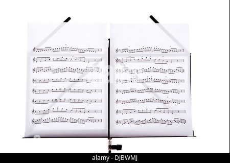 Melody sheets on a music sheet stand isolated in white Stock Photo