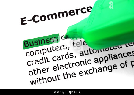 The word e-commerce highlighted in green with felt tip pen Stock Photo