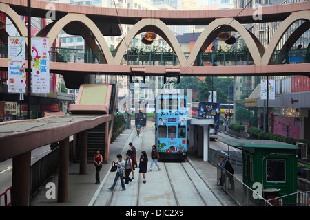 Double decker tramway downtown in Central Hong Kong, China Stock Photo