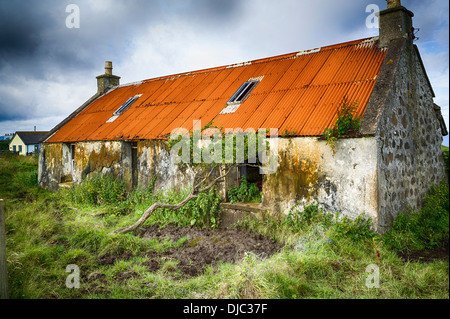 Old Scottish crofting cottage in decay near Uig Skye UK Stock Photo