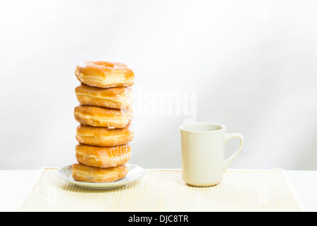coffee and donuts on white Stock Photo