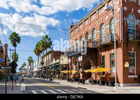 Shops, bars and restaurants on Seventh Avenue in historic Ybor City, with the Centro Espanol to the right, Tampa, Florida, USA Stock Photo