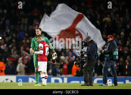 London, UK. 26th Nov, 2013. ( Jack Wilshere (2nd L) of Arsenal greets goalie Wojciech Szczesny (1st L) after the UEFA Champions League Group F match between Arsenal and Marseille at Emirates Stadium in London, Britain on Nov. 26, 2013. Arsenal won 2-0 Credit:  Xinhua/Alamy Live News Stock Photo