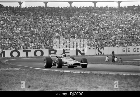 Denny Hulme in a McLaren Cosworth M14A in the German GP, Hockenheim, Germany 2 Aug 1970. Stock Photo