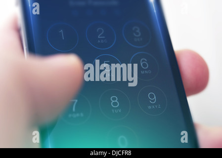 Mobile Passcode Security - Mobile Security Application Interface on Mobile Device. Smartphone in a Hand. Stock Photo