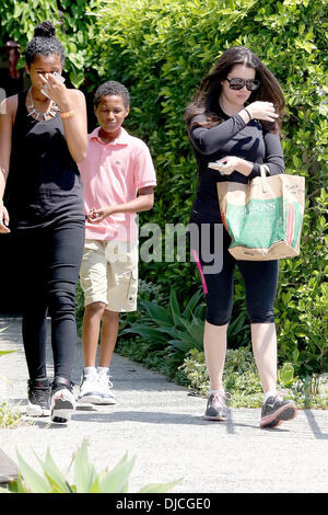 Khloe Kardashian, step-daughter Destiny Odom and step-son Lamar Odom Jr Khloe Kardashian running errands with her step-children in Beverly Hills Los Angeles, California - 22.08.12 Where: United States When: 22 Aug 2012 Stock Photo