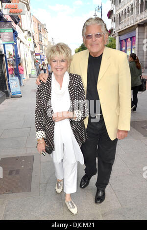 TV presenter Gloria Hunniford with husband and celebrity hairdresser Stephen Way, spotted walking past The Gaiety Theatre. Dublin, Ireland - 28.08.12 Stock Photo