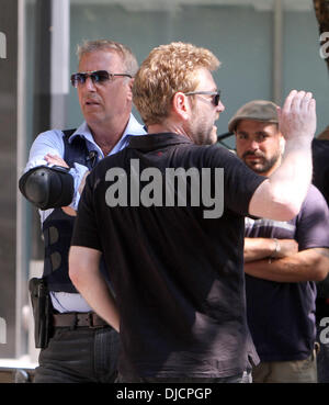 Kevin Costner, Kenneth Branagh Filming scenes for 'Jack Ryan' in Manhattan New York City, USA - 01.09.12 Stock Photo