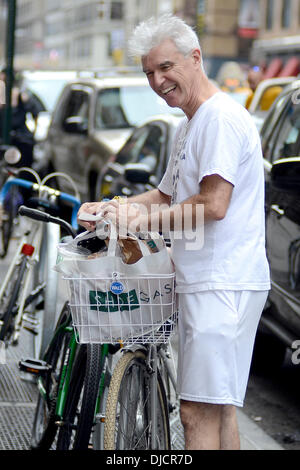 David Byrne Former Talking Heads frontman returns to his bicycle with groceries, after shopping at Whole Foods Market New York City, USA - 02.09.12