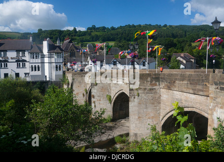Llangollen Bridge stone arched bridge over River Dee and view to town Denbighshire North East Wales UK Stock Photo