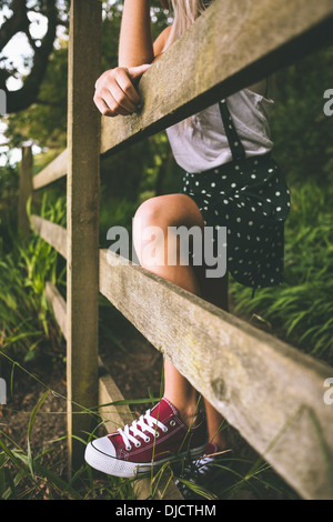 Picture of mid section from a woman wearing dotted skirt Stock Photo