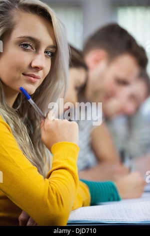 Blonde cheerful student looking at camera Stock Photo - Alamy