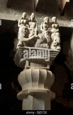 Pillar details in chaitya hall. Shows inverted bell capital with couples riding elephants on upper portion. Karla Caves Stock Photo