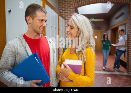 Two smiling students chatting Stock Photo